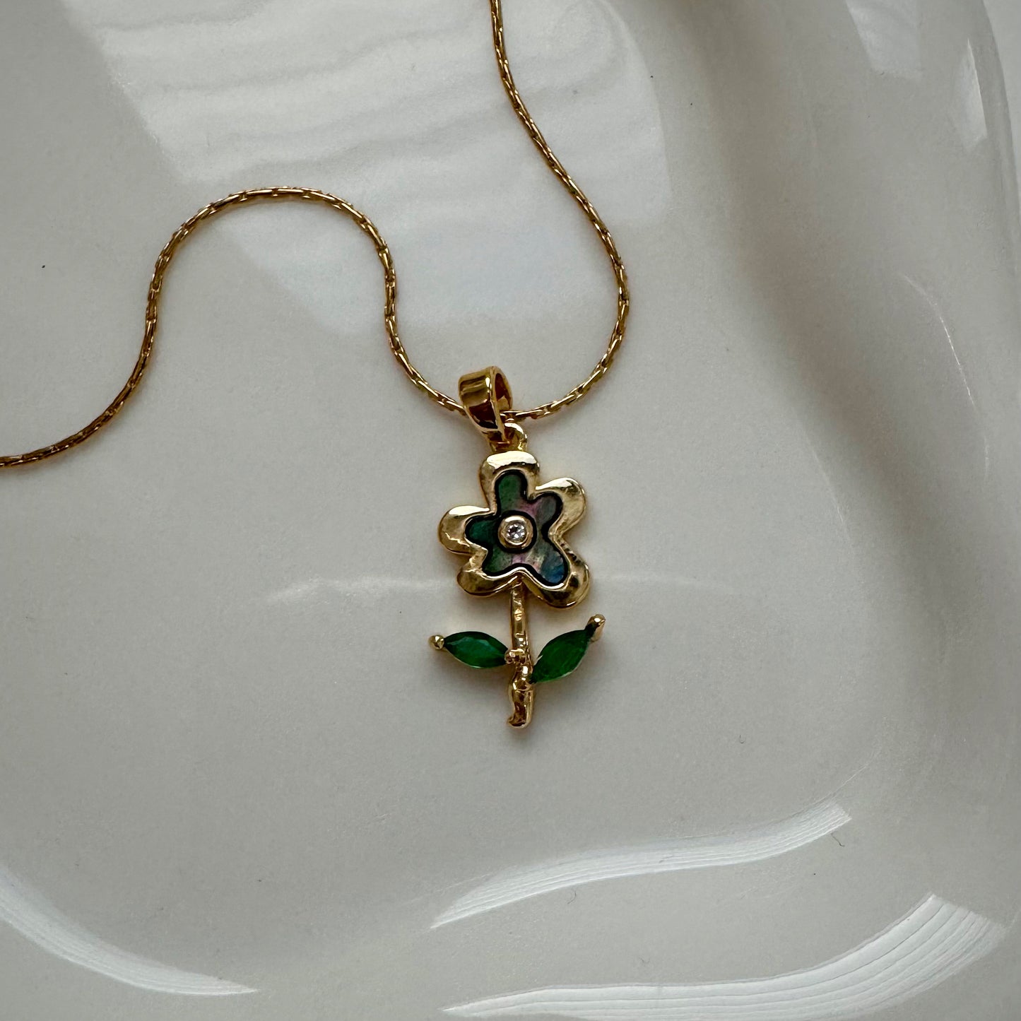 green flower pendant